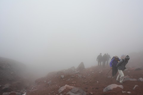 Us climbing up through the mist to the glaciers of Cotopaxi